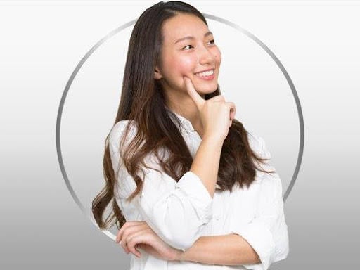 Smiling young woman wearing red T-shirt, happy after Cantesten's treatment and complete relief from thrush and its 6 main symptoms
